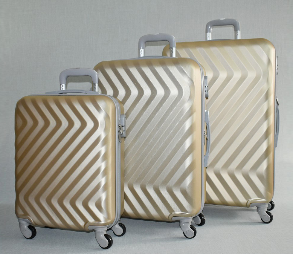 Златист комплект куфари твърд с колелца